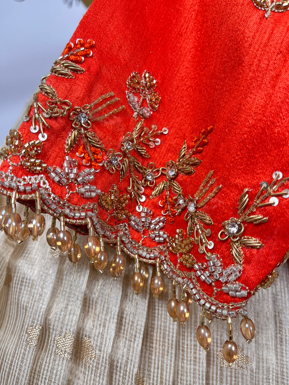 Half While and Orange Jari Kota Lehenga