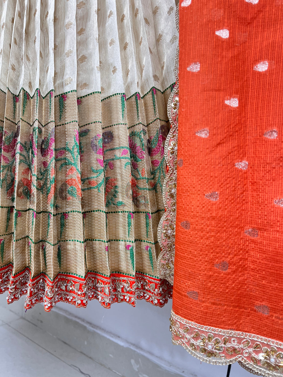 Half While and Orange Jari Kota Lehenga